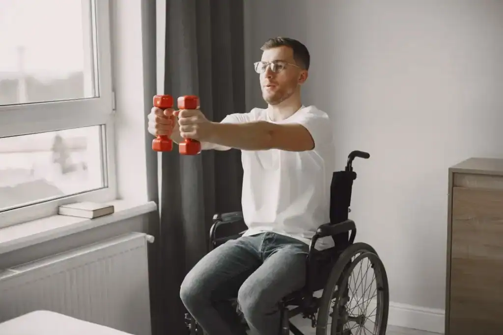 Image of man doing exercise in his wheelchair to aid weight loss Buckingham