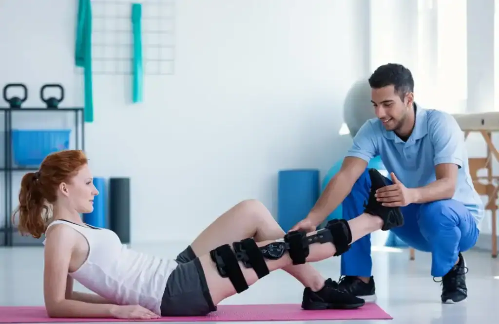 Woman having treatment to help muscle recovery Buckingham after an injury